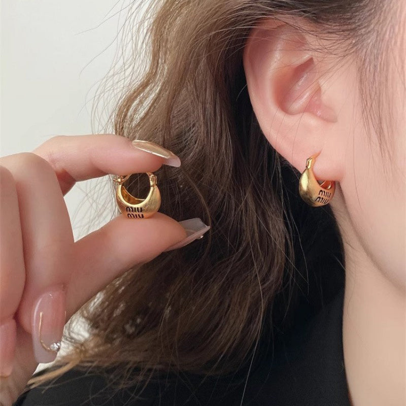 One Cold Style Simple Metal Earrings Retro High Fashion Style Texture Round Earrings